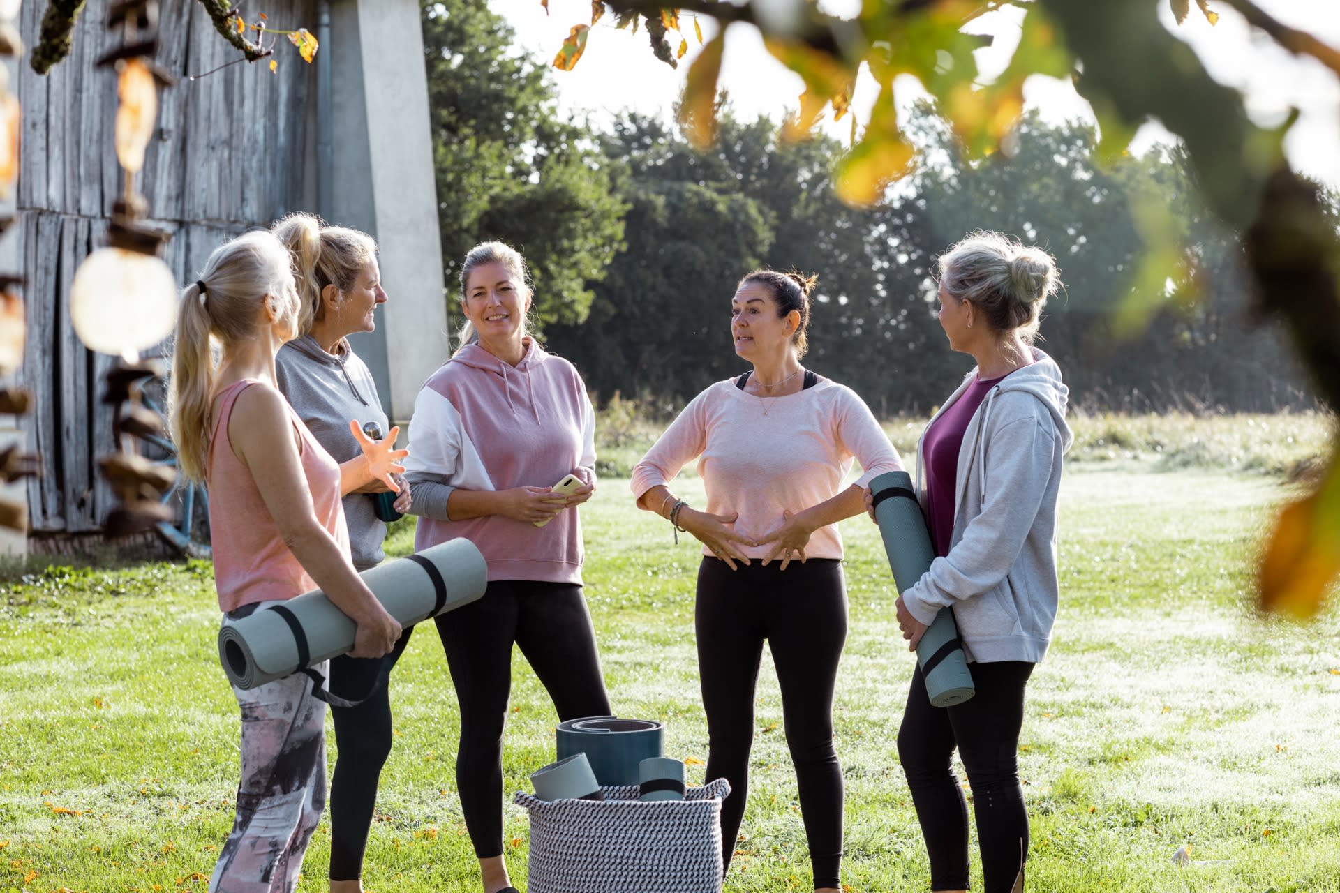 women on wellness retreat doing breathwork